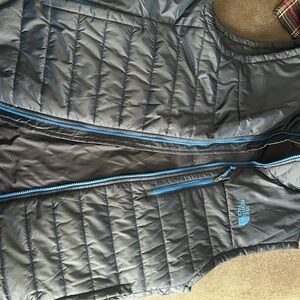 The North Face Gray Puffer Vest with Blue Accents
